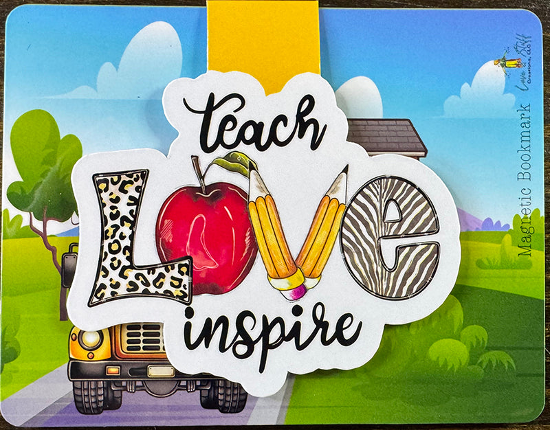 Magnetic bookmark with “Teach Love Inspire” quote, apple and pencil illustrations, and yellow tab