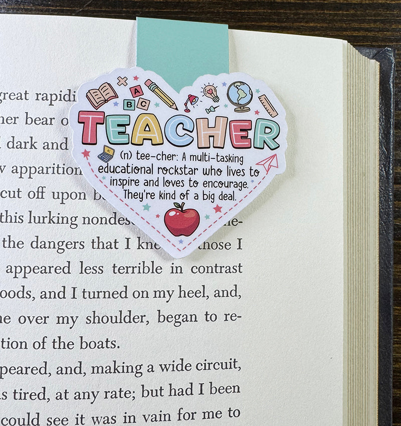 Heart-shaped teacher magnetic bookmark with colorful icons and a fun inspirational definition