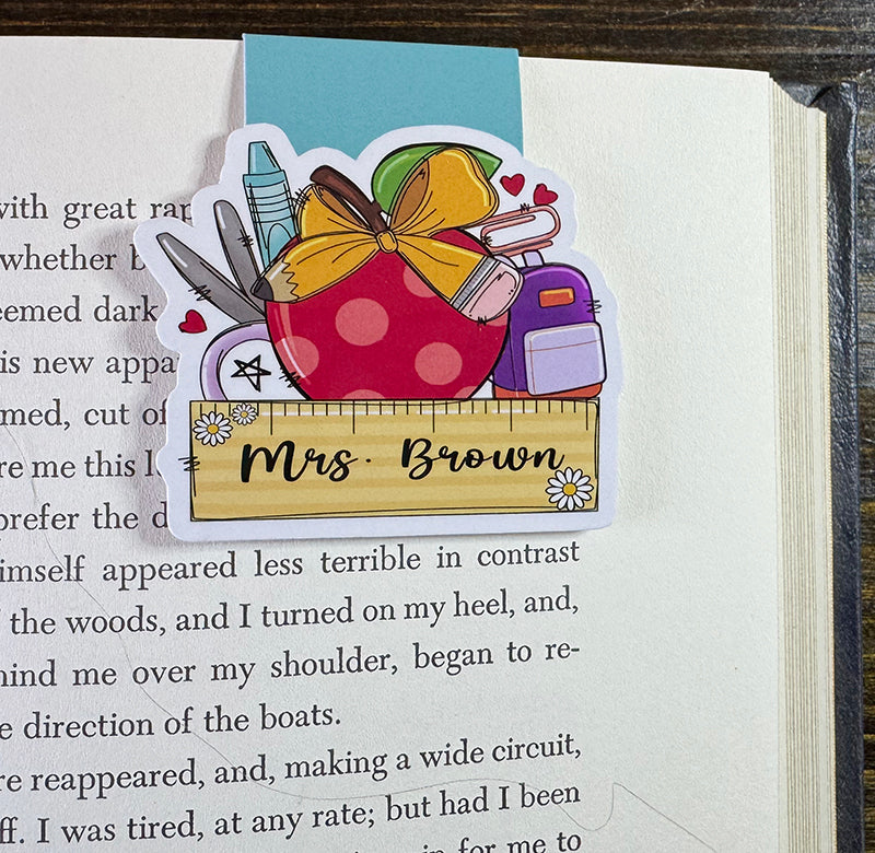 Personalized magnetic bookmark with red apple, school supplies, and ruler nameplate for teachers