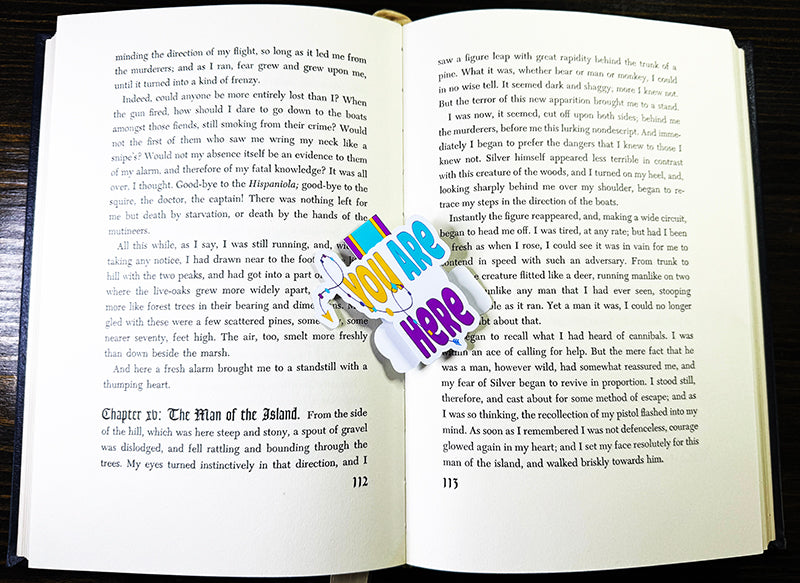 Colorful magnetic bookmark with “You Are Here” text and arrow path design