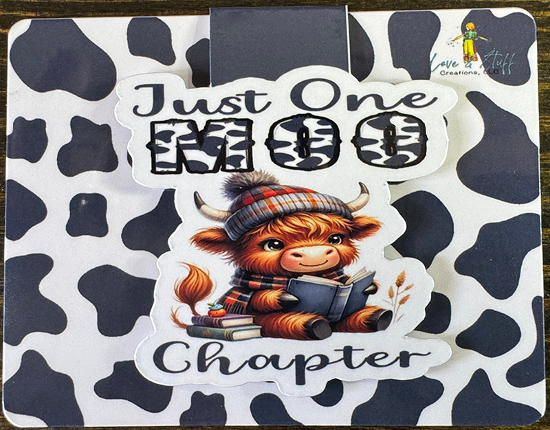 “Cute Highland cow magnetic bookmark with book and plaid beanie that says 'Just One Moo Chapter'”