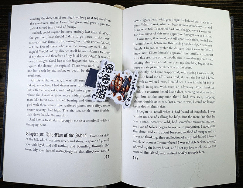 “Cute Highland cow magnetic bookmark with book and plaid beanie that says 'Just One Moo Chapter'”