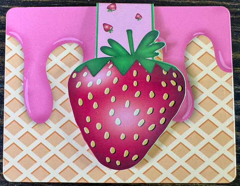 Cute strawberry magnetic bookmark with pink background and yellow seed details