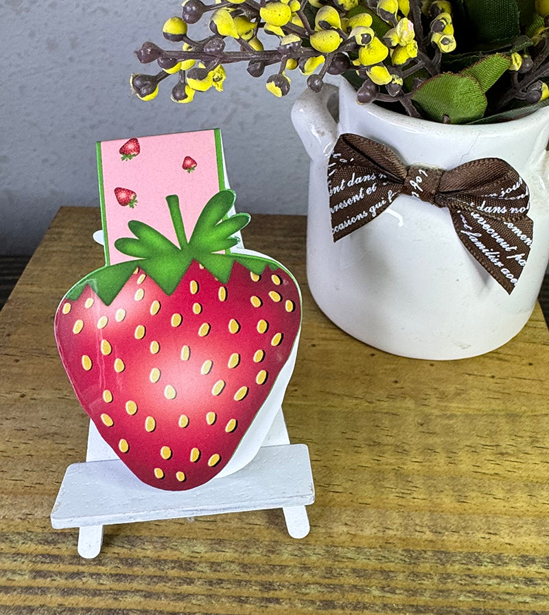 Cute strawberry magnetic bookmark with pink background and yellow seed details