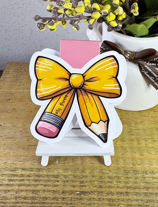 Personalized teacher magnetic bookmark with yellow bow and pencil design and custom name on pencil