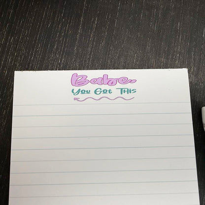 5x7 motivational notepad with “Babe, You Got This” at the top, lined pages, and 50 sheets – perfect for notes, lists, and journaling. Close up view of saying.