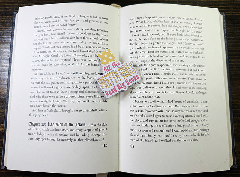 Magnetic bookmark with “All the Pretty Girls Read Big Books” in pink and yellow with polka dot background