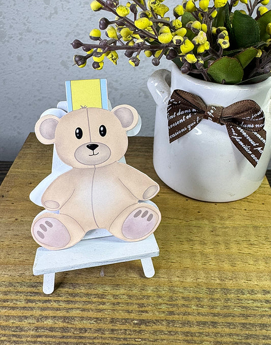Teddy bear magnetic bookmark with soft beige bear design and yellow-blue striped magnetic tab