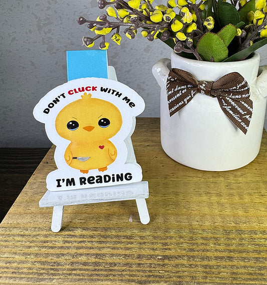 “Yellow baby chick magnetic bookmark with ‘Don’t Cluck With Me, I’m Reading’ quote”