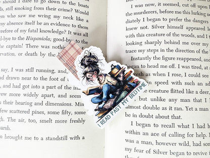 Magnetic bookmark with girl reading past bedtime, surrounded by books and pillows, with plaid tab